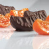 Spicchi di Clementine calabresi infusi in marasca e ricoperti di cioccolato fondente (3 kg)